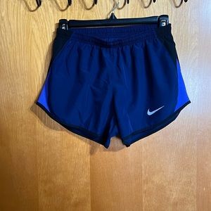 Navy blue Dri-Fit Nike shorts.